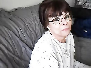 Dark Haired Granny Taking Some Cumshots