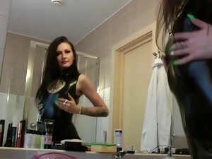 Latex Clad Mistress Nika Entices With Her Captivating Body Before A Kink Session