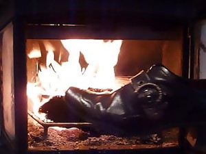 Burning Wifes Brown Buckle Shoe In The Fireplace